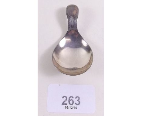 A Georgian silver bright cut caddy spoon by Thomas Northcote 