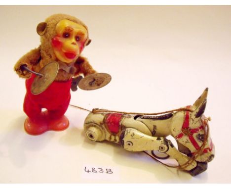 A clockwork toy monkey and a Muffin the Mule metal puppet - a/f