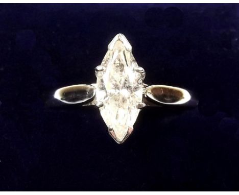 An 18 carat white gold marquise cut diamond solitaire ring (the stone 1.09 carats)