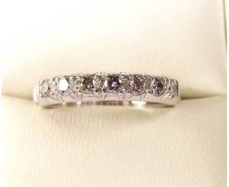 A 9 carat gold diamond set half eternity ring