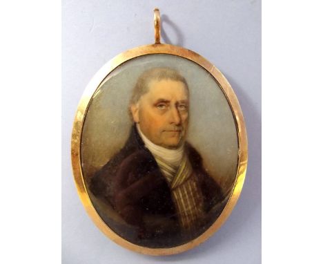 A 19th century oval watercolour on ivory portrait miniature of a gentleman in yellow metal frame with enamelled hair locket t