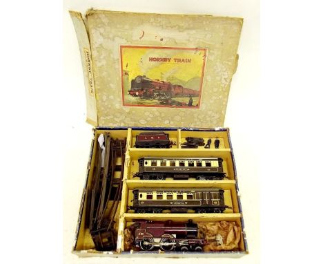 A Hornby tin plate 'O' gauge clockwork Pullman train set comprising LMS engine 1185 and tender, two carriages Verona and Lorr