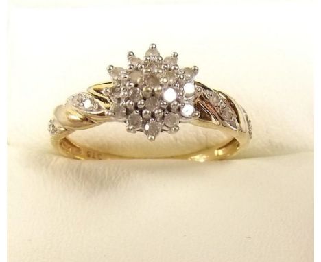 A 9ct gold diamond cluster ring 