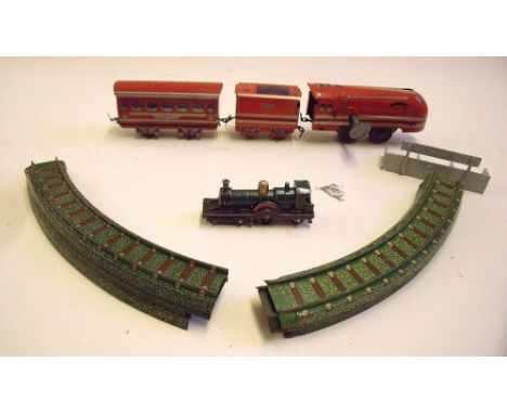 A 1930's Coronation Class railway train and eight pieces of track and a Lesney Duke of Connaught No.14 model of the yesteryea