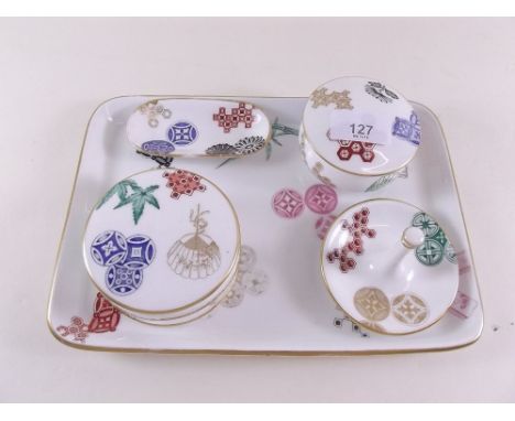 A Royal Worcester five piece dressing table set painted Chinese symbols 