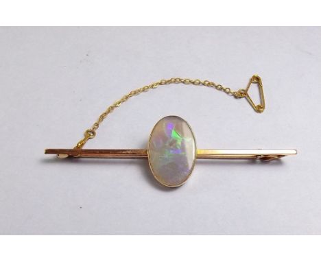 A 15ct gold bar brooch set opal 