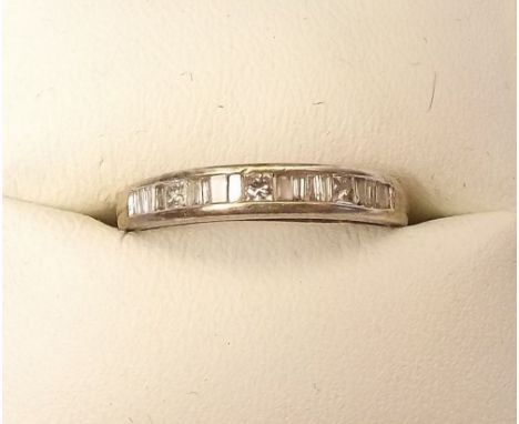 A 9ct white gold diamond half eternity ring 