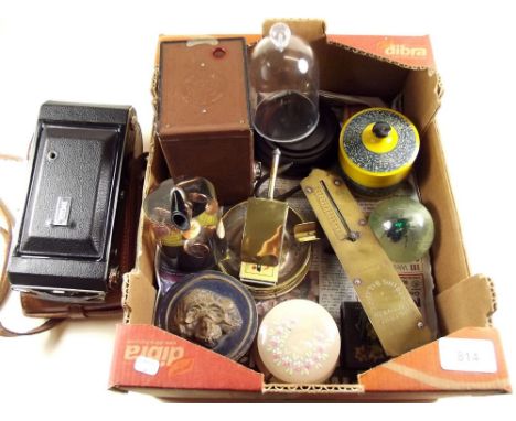 A box of collectables to include folding camera, Salter spring scale, pen holders, trench art ashtray etc