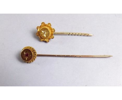 Two Edwardian 9ct gold stick pins 