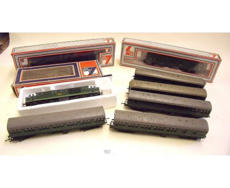 A Triang diesel carriage set, two boxed Lima diesel locomotives and Hornby diesel