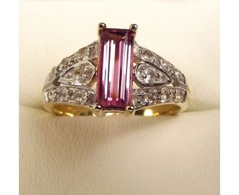 A 9k gold ring set Morro Redondo pink tourmaline and white sapphires 