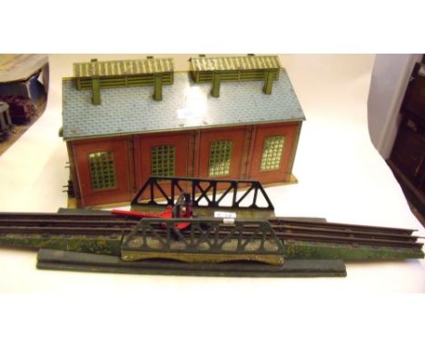 A Hornby 'O' gauge electric rail Viaduct and ramps and a Hornby tin plate electric 'O' gauge engine shed - two doors missing 