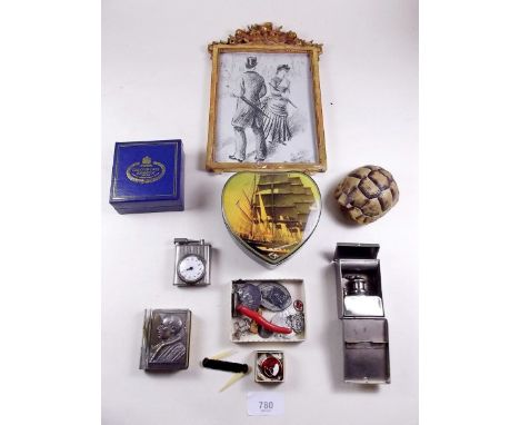 A box of collectables including lighter 