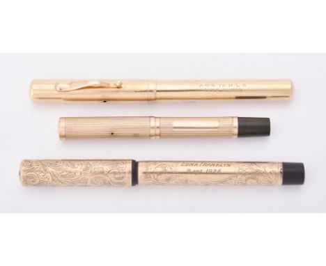 
	
		A 9 carat gold fountain pen, London 1925, engraved with foliate swags and a presentation inscription, no nib, lever fill