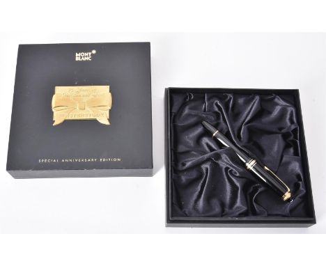 
	
		Montblanc, Meisterstuck, 75 Years of Passion and Soul, a black fountain pen, the cap with a diamond set gilt clip and tr