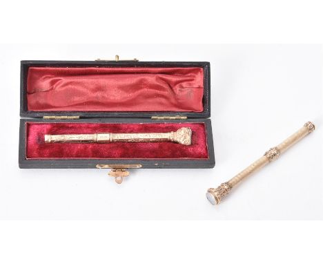 
	
		A late Victorian propelling pencil, the scrolled barrel engraved F. Sylvester and the push slide engraved Feb 19 1885 Ag