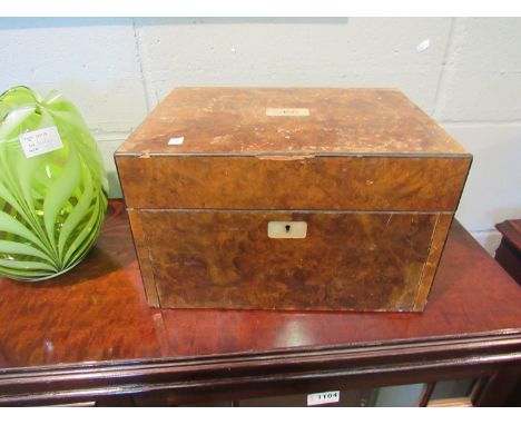 A burr and mother-of-pearl work box for restoration