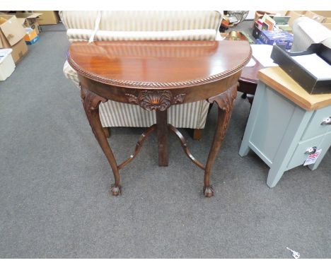 A 20th Century mahogany console table and coffee table