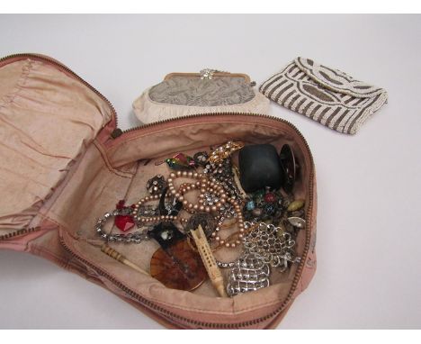 A collection of costume jewellery including Scottish brooches and a bugle bead purse, etc