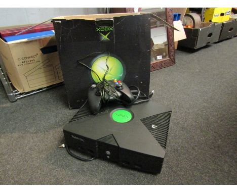 An Xbox games console, boxed