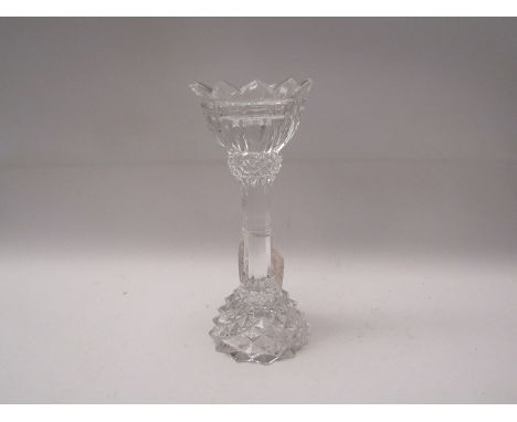 A heavy glass candlestick, 25cm tall