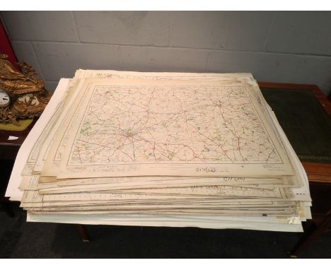 A large quantity of mainly Ordnance Survey larger street maps circa 1920's and later, all UK, some linen backed