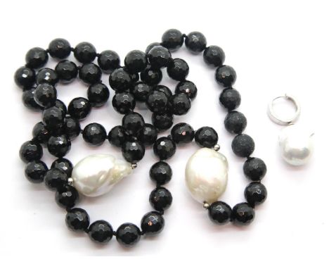 Black glass bead necklace set with two Baroque pearls and a single silver set Baroque pearl earring. L: 70 cm, pearls L: 31 m