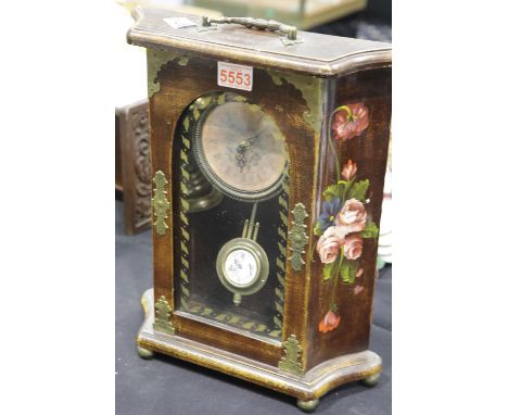Oak cased mantel clock with brass mounts and decorative floral designs, H: 40 cm. P&amp;P Group 3 (£25+VAT for the first lot 