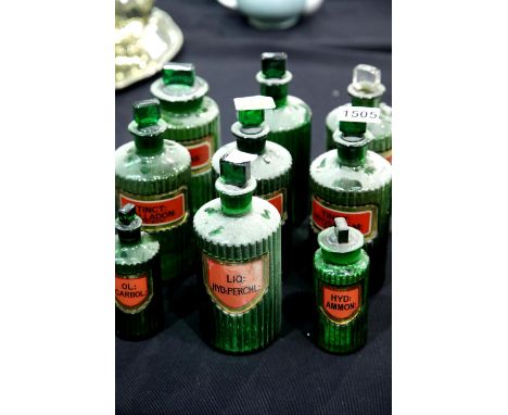Nine vintage green glass apothecary poison bottles with labels, H: 20 cm. P&amp;P Group 3 (£25+VAT for the first lot and £5+V