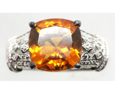 925 silver ring with large orange stone with diamond shoulders, size Q, 4.9g. P&amp;P Group 1 (£14+VAT for the first lot and 