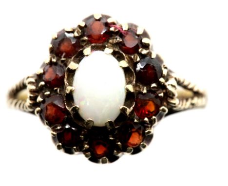 9ct gold, garnet and opal ring, size O, 3.0g. P&amp;P Group 1 (£14+VAT for the first lot and £1+VAT for subsequent lots) 