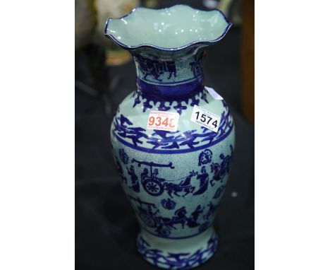 Oriental vase with green background decorated with blue figurines and horses, H: 35 cm. P&amp;P Group 3 (£25+VAT for the firs