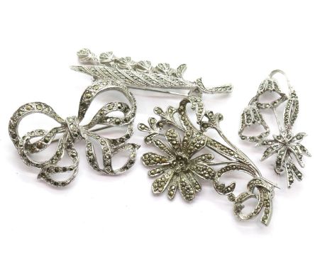 Four white metal marcasite set vintage brooches. P&amp;P Group 1 (£14+VAT for the first lot and £1+VAT for subsequent lots) 