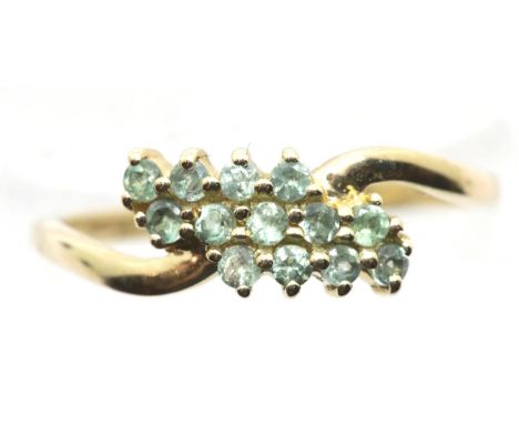 10ct gold ring set with green stones, size O, 1.7g. P&amp;P Group 1 (£14+VAT for the first lot and £1+VAT for subsequent lots