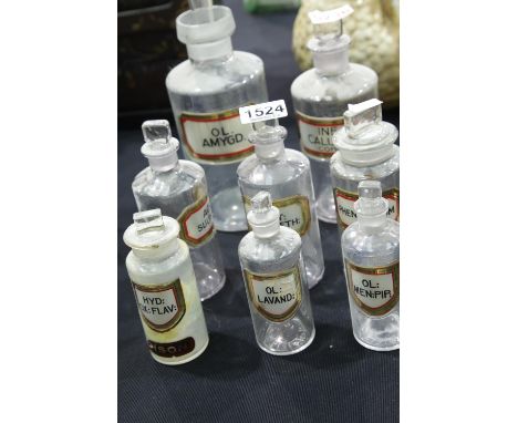 Eight vintage labelled pharmacy bottles with stoppers.  P&amp;P Group 3 (£25+VAT for the first lot and £5+VAT for subsequent 