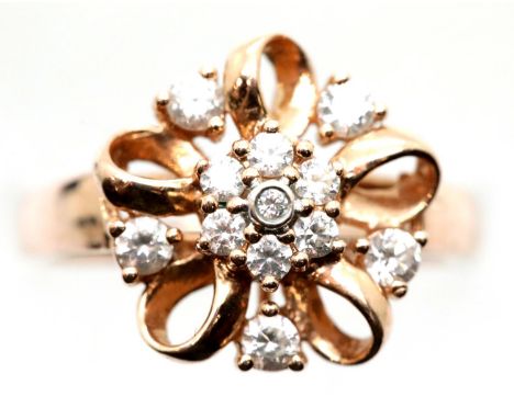 14ct rose gold flower ring set with white stones, size P, 4.1g. P&amp;P Group 1 (£14+VAT for the first lot and £1+VAT for sub