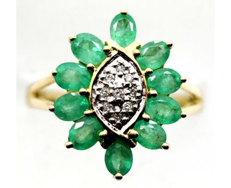 9ct gold, emerald and diamond flower ring, size N/O, 3.2g. P&amp;P Group 1 (£14+VAT for the first lot and £1+VAT for subseque