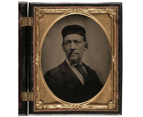 * Ambrotype. Half-plate ambrotype of a man, possibly an artist, c. 1860, 12 x 12 cm, in a full, hinged Union caseQTY: (1)
