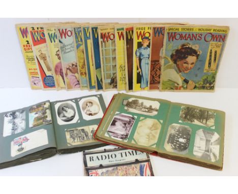 Two postcard albums containing circa 440 cards including scenic cards, comic cards, photographic cards etc together with Woma