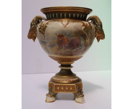 A Royal Worcester porcelain twin handled vase, with a flared rim, with twin rams head handles, the body painted with highland