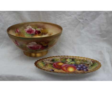 A Royal Worcester porcelain bowl painted with roses and leaves to a blush ivory ground, signed R Austin, puce mark and date c
