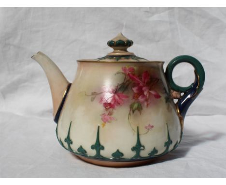 A Hadley's Worcester teapot and cover, with raised decoration of pointed leaves, the body transfer and infil decorated with f