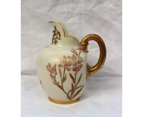 A Royal Worcester porcelain flatback jug, transfer and infil decorated with flowers and leaves, with a gilt ribbed handle, pu