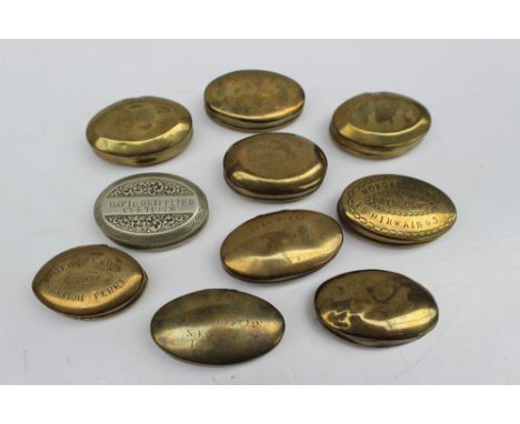 A collection of late 19th / early 20th century oval and circular brass and base metal tobacco twist tins, some inscribed, inc