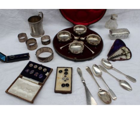 A set of four Edwardian silver cased open table salts with matching spoons, London, 1901, together with a silver christening 