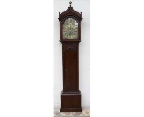 A 19th century oak longcase clock, the arched hood with a globe finial and Ionic columns above a long trunk door, box base an