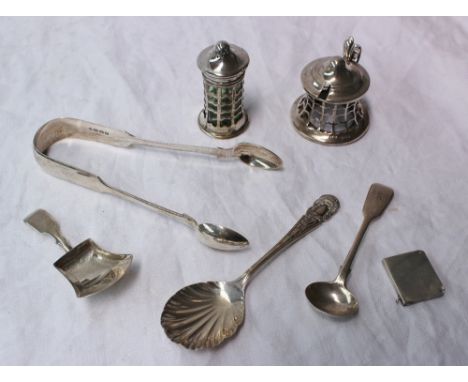 An Edwardian silver mustard pot and matching pepperette, Birmingham, 1907, together with a silver caddy spoon, other spoons, 