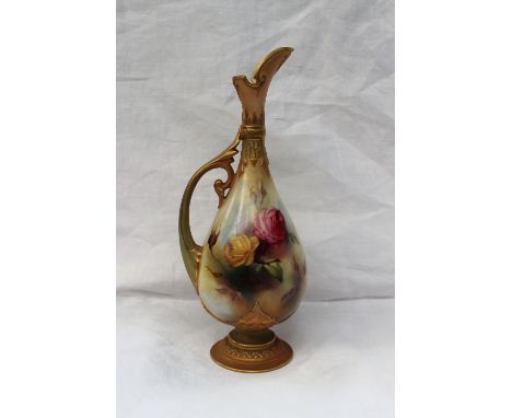 A Royal Worcester porcelain jug, painted with roses and leaves to a blush ivory ground, with moulded leaves and gilt decorati