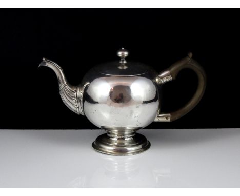 A rare antique George II Scottish Provincial Sterling Silver bullet teapot by James Glen, Glasgow 1743. Of bullet form, on a 