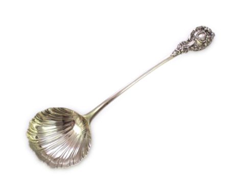 A spectacular antique George II Sterling Silver soup ladle by William Turner, London 1755. With a scallop shell bowl and very